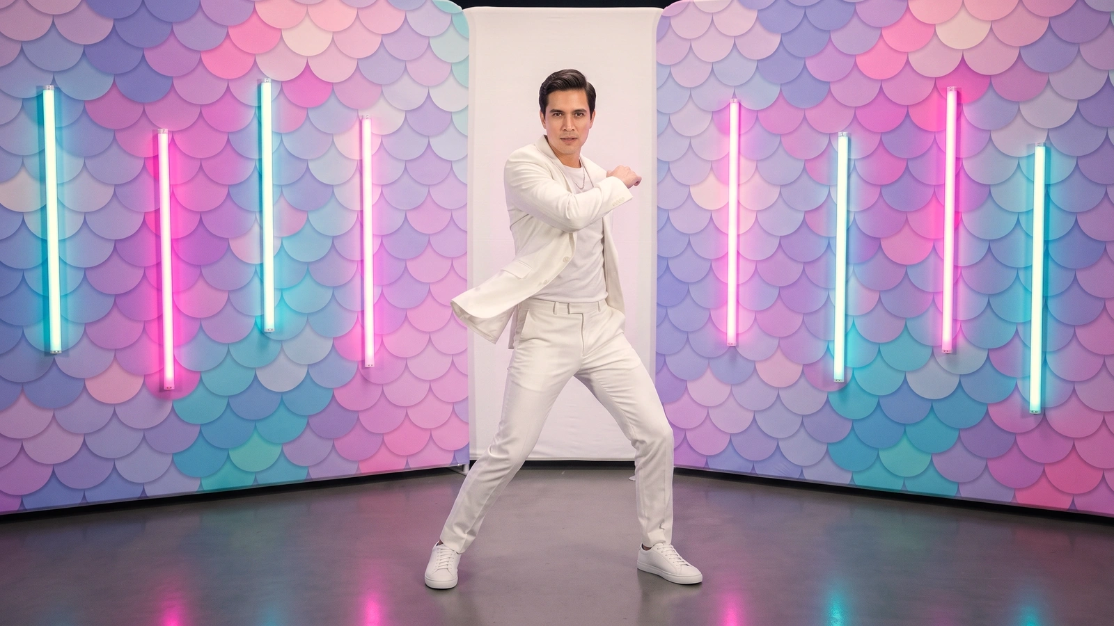 RGB Dazzle Booth — a subject dancing under bold, designed cinematic RGB lighting.